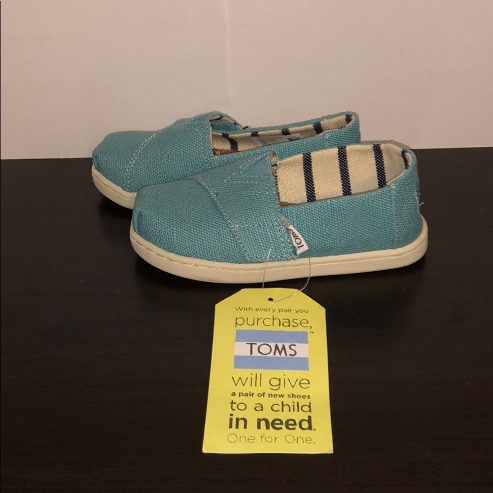 Toms for Toddlers. Size 8.0 BRAND NEW! NEVER WORN!